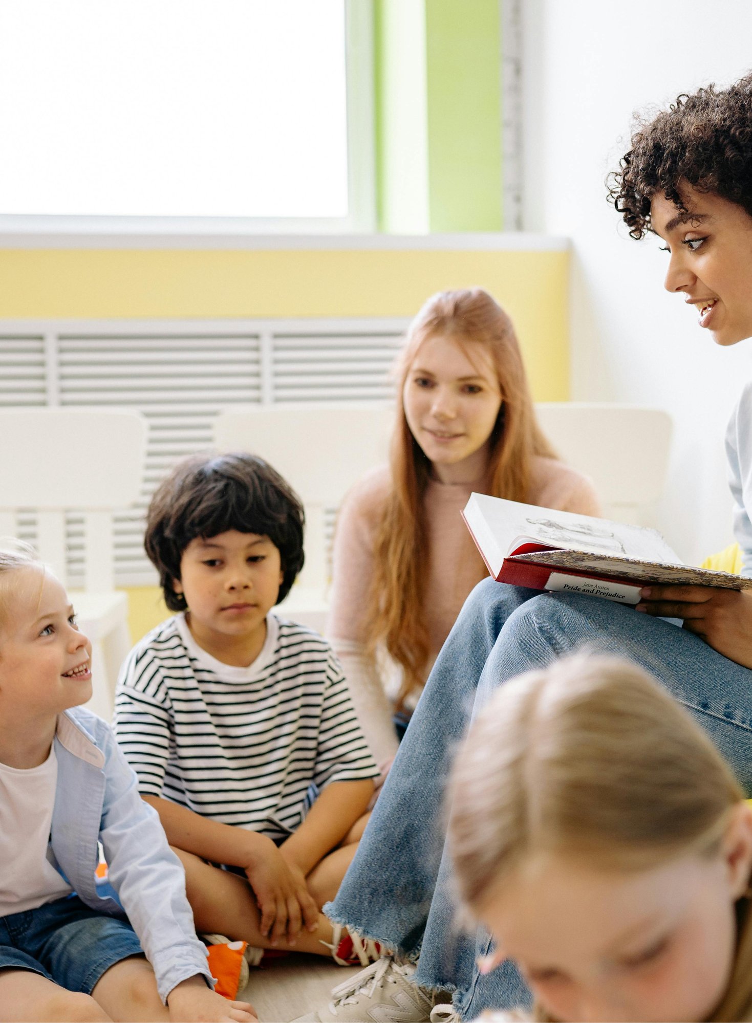 Teacher reading to children